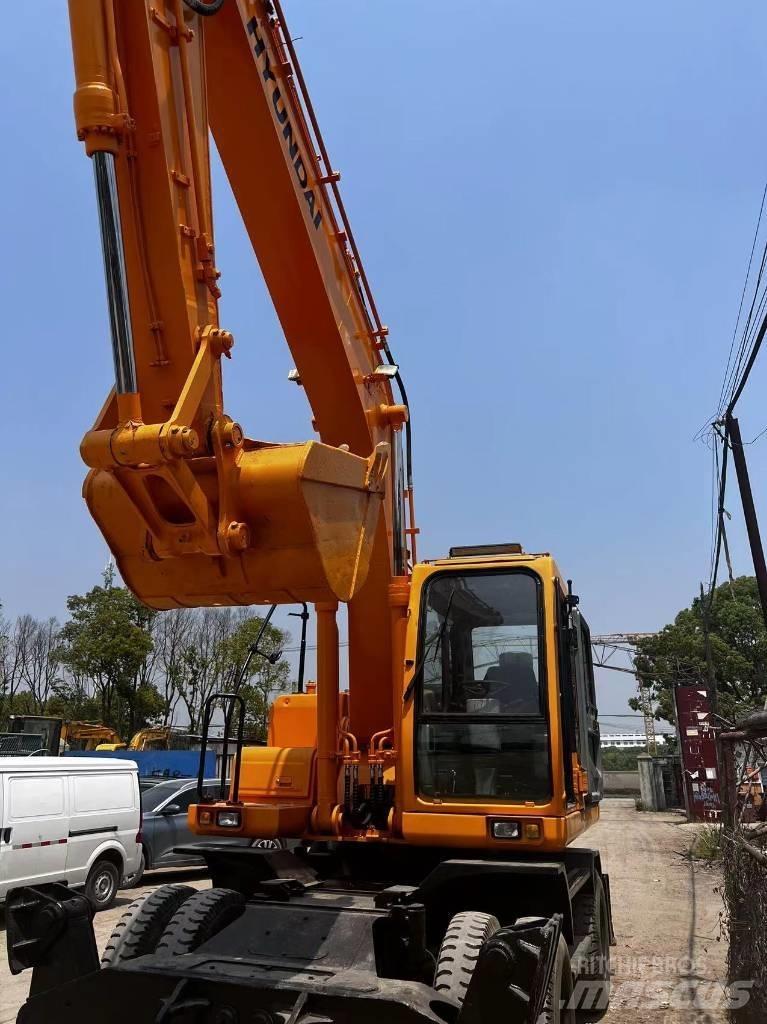 Hyundai 210W-7 Колёсные экскаваторы