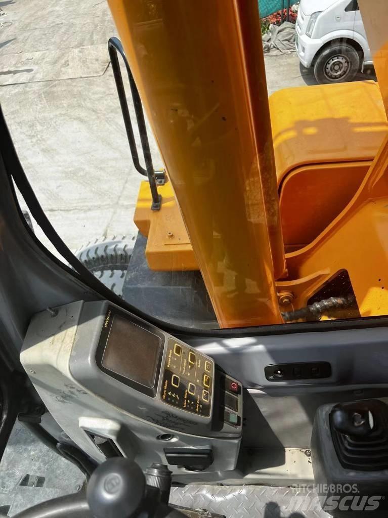 Hyundai 210W-7 Колёсные экскаваторы