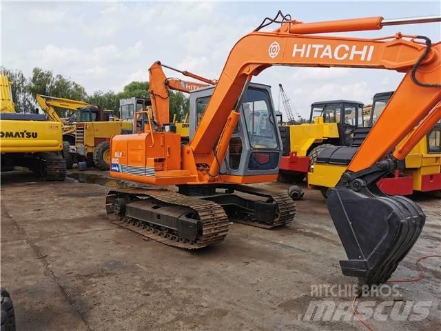 Hitachi EX60 Гусеничные экскаваторы