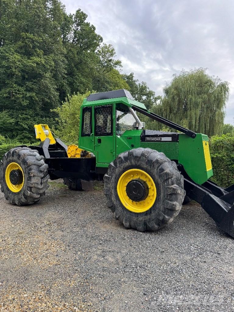 Timberjack 450B Лесохозяйственные тракторы