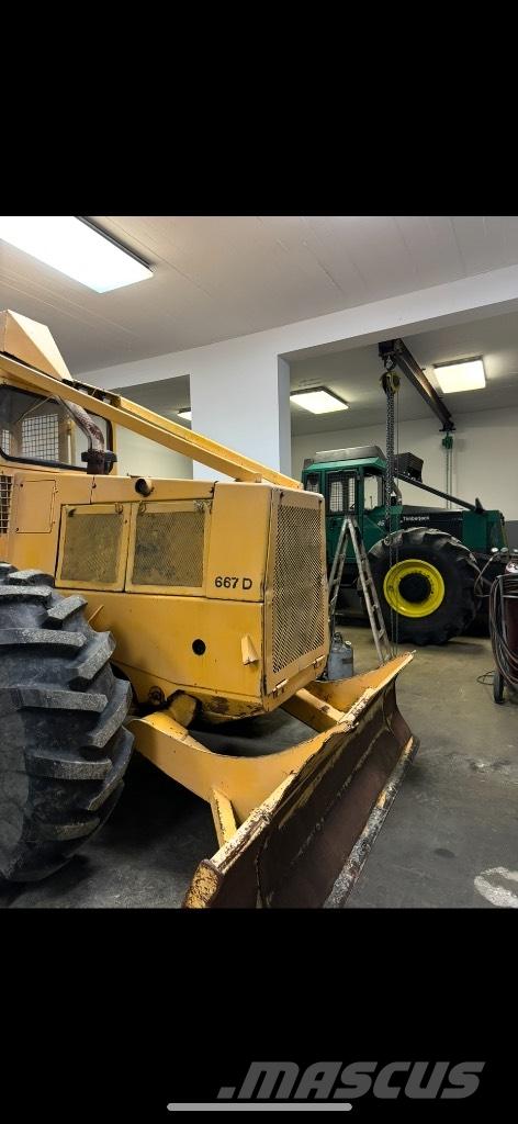 Timberjack 450B Лесохозяйственные тракторы