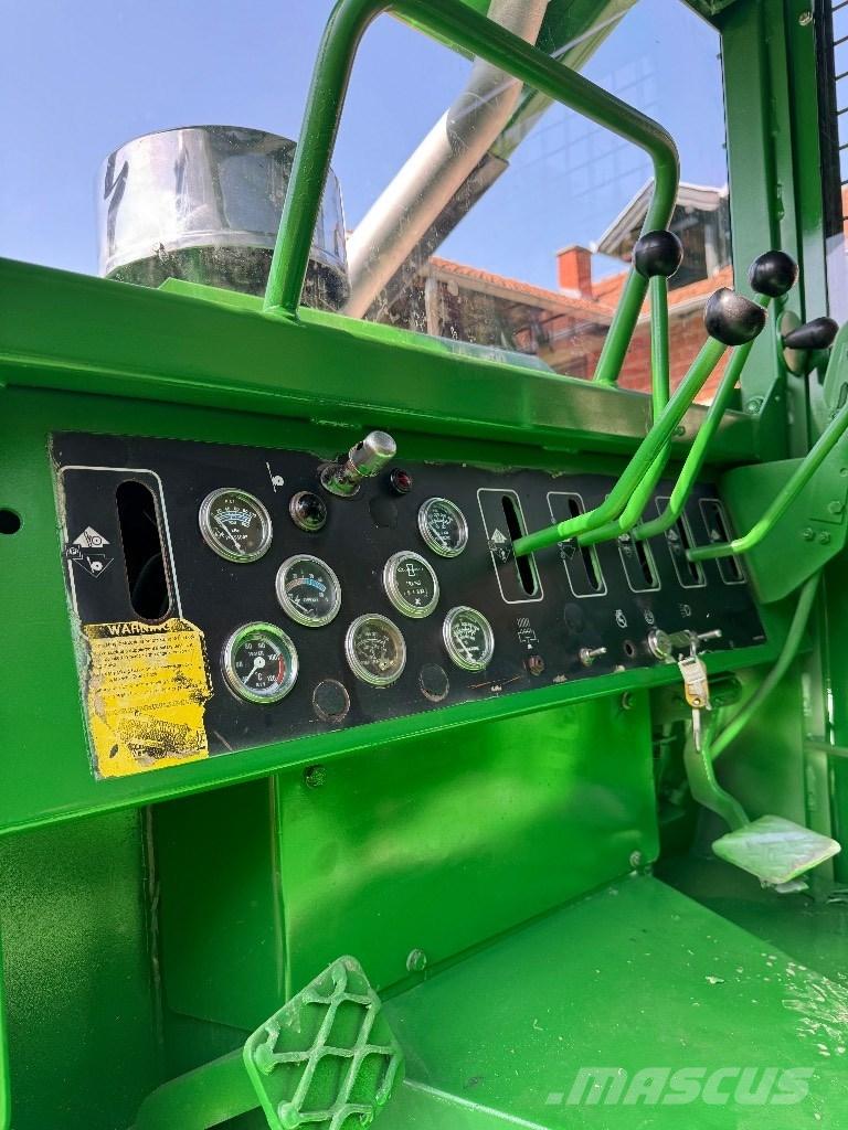 Timberjack 450B Лесохозяйственные тракторы