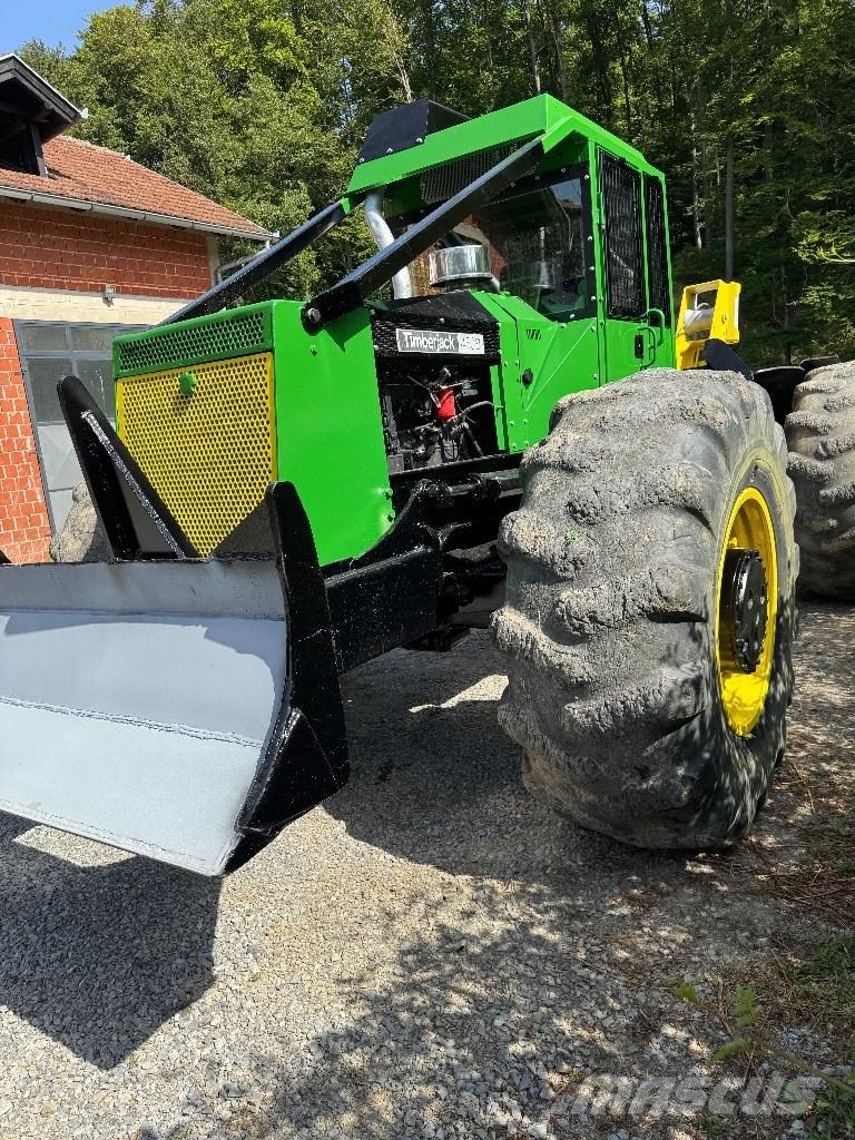 Timberjack 450B Лесохозяйственные тракторы