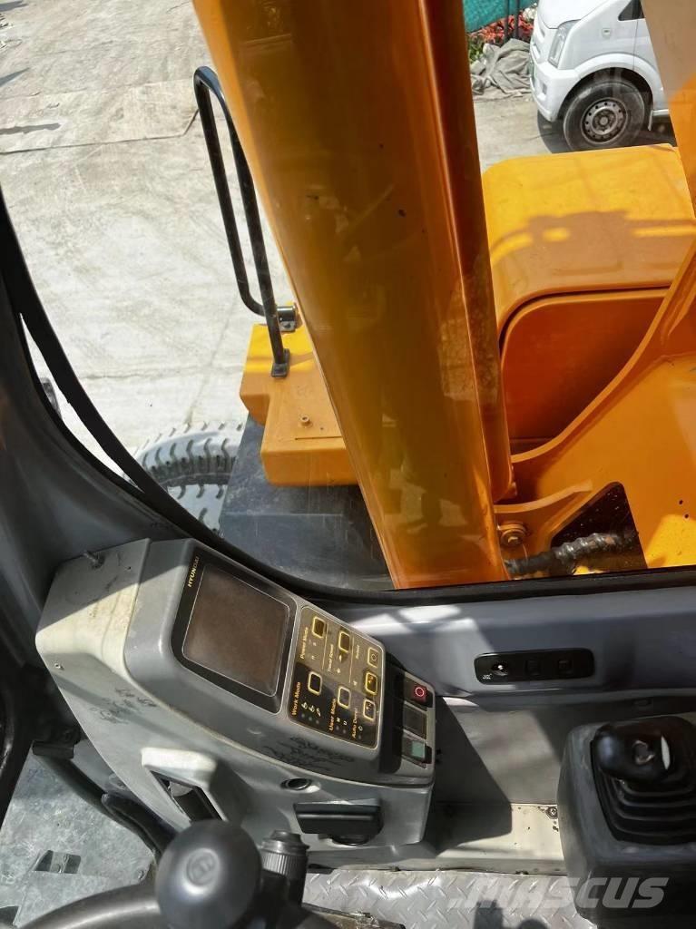 Hyundai 210W-7 Колёсные экскаваторы
