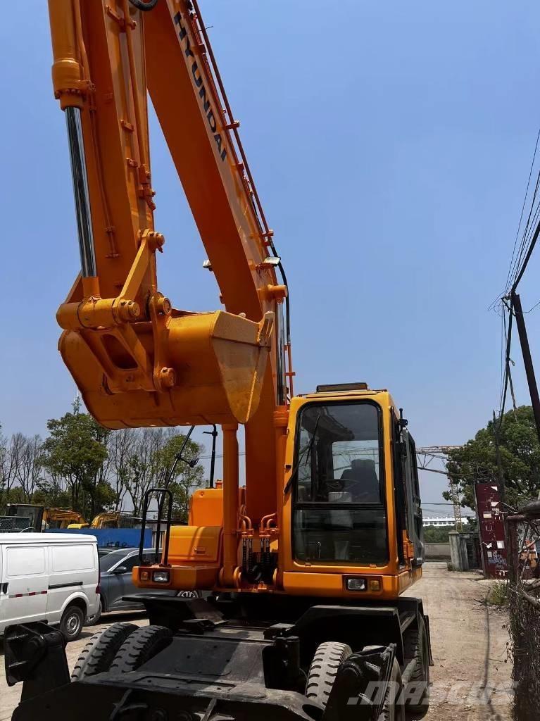 Hyundai 210W-7 Колёсные экскаваторы