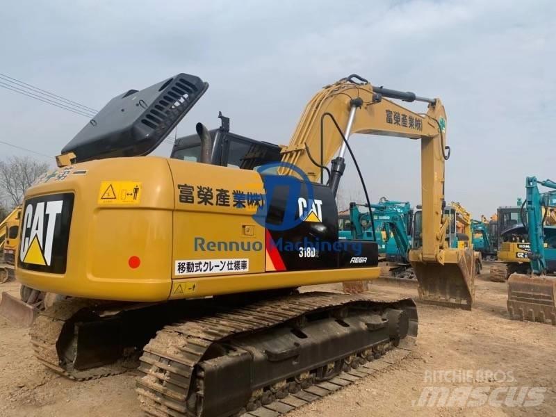 CAT 318DL Гусеничные экскаваторы