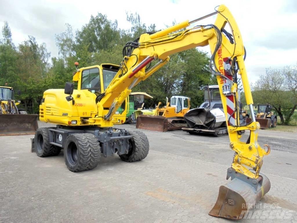 Takeuchi TB 295 W-2 Колёсные экскаваторы