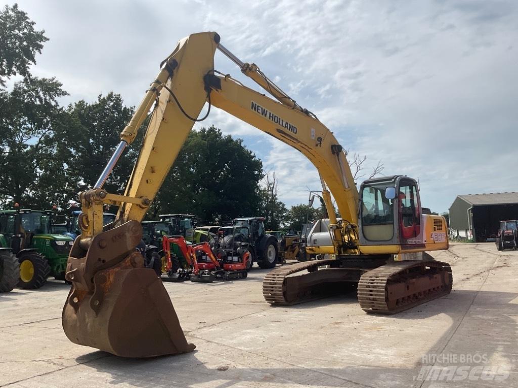 New Holland E 305 Гусеничные экскаваторы