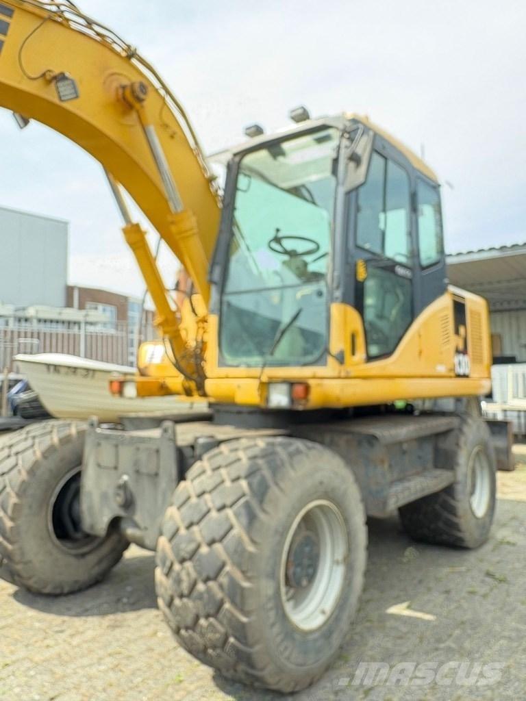 Komatsu PW 130-7K Колёсные экскаваторы