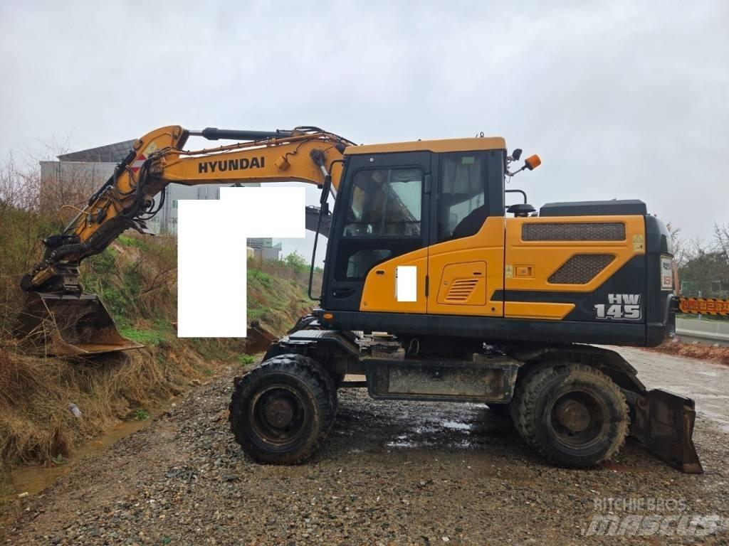 Hyundai HW 145 Колёсные экскаваторы