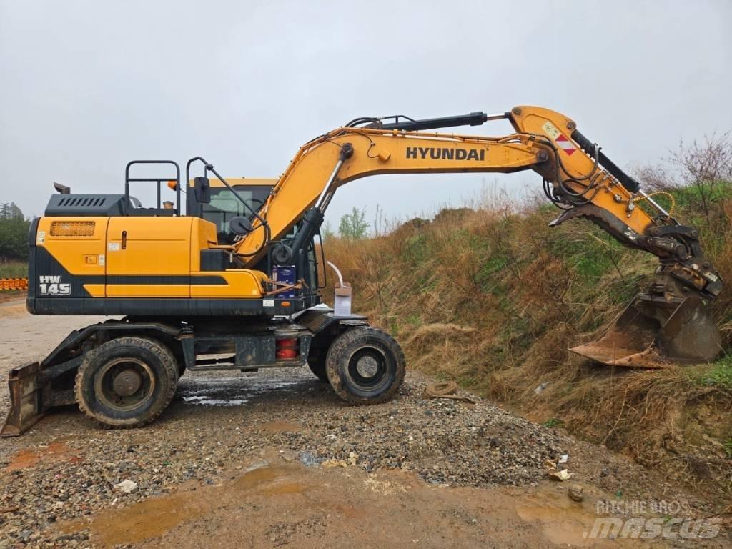 Hyundai HW 145 Колёсные экскаваторы