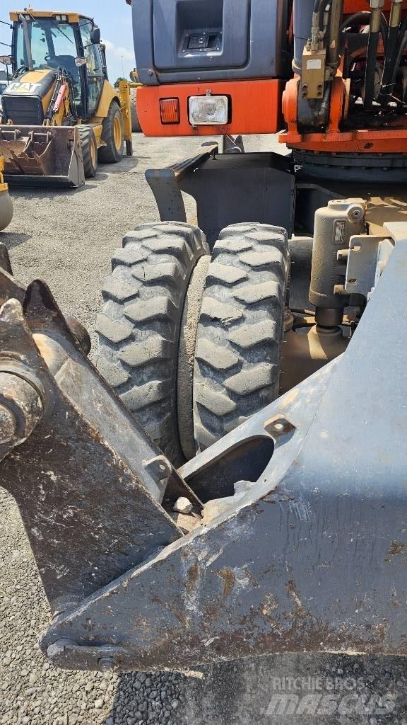 Fiat-Kobelco E215W Колёсные экскаваторы