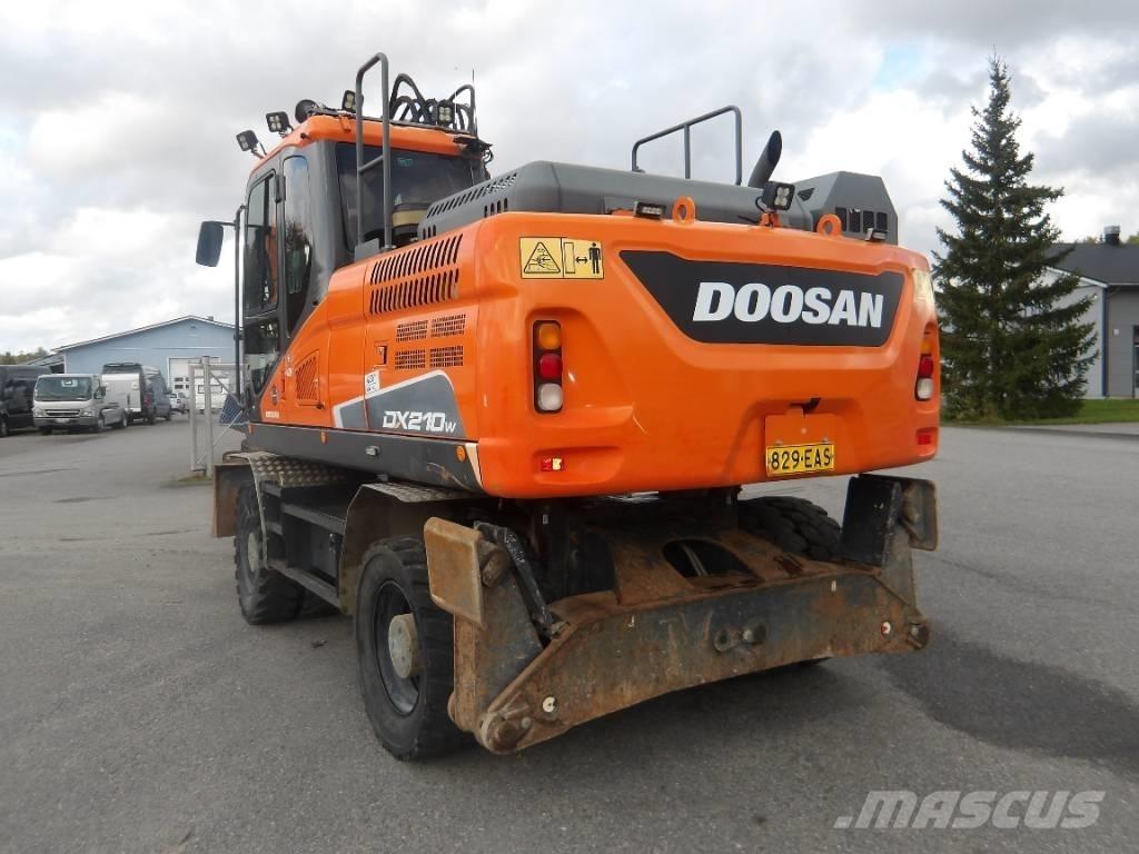 Doosan DX 210 WE Колёсные экскаваторы