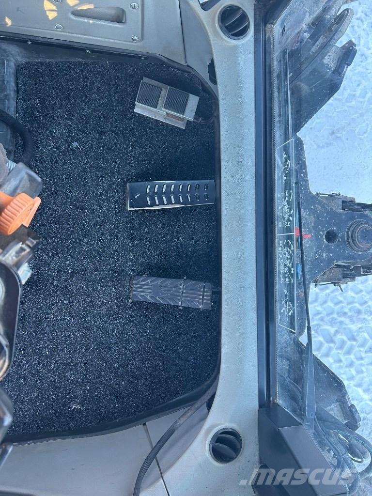 Huddig 1260 C Экскаваторы-погрузчики