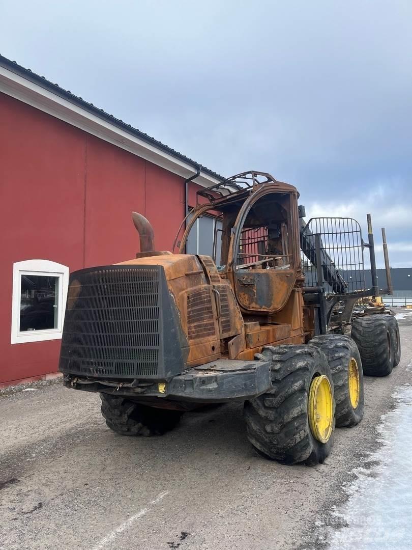 John Deere 1110E Форвардеры