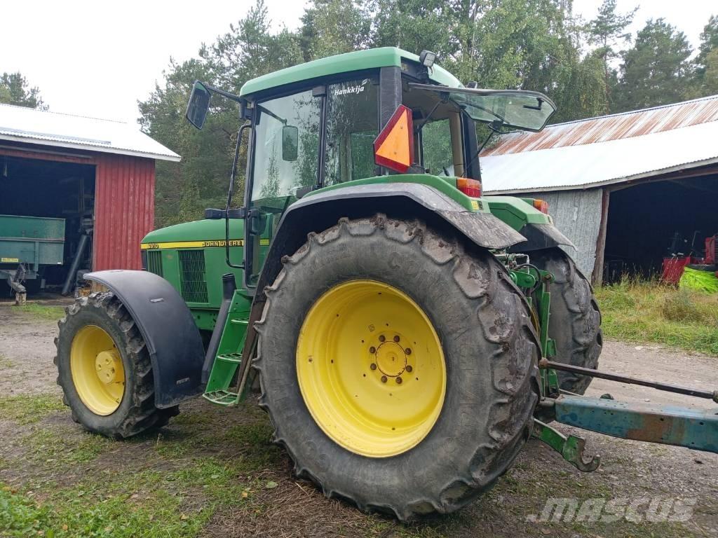 John Deere 6910 Трактора