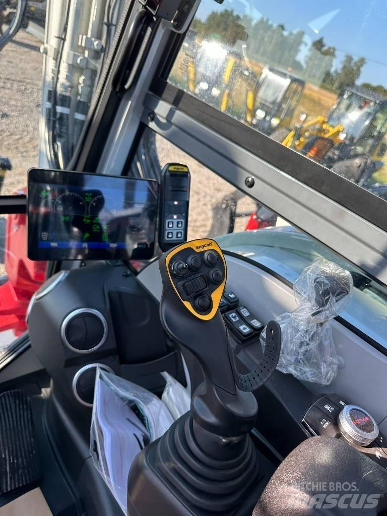 Takeuchi TB 395 W Колёсные экскаваторы