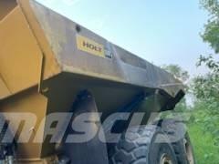 CAT 740 B Шарнирно-сочленённые самосвалы