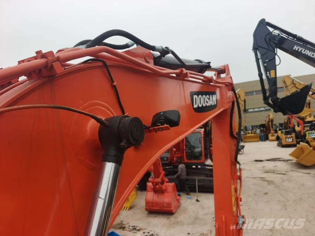 Doosan DX 140 Гусеничные экскаваторы