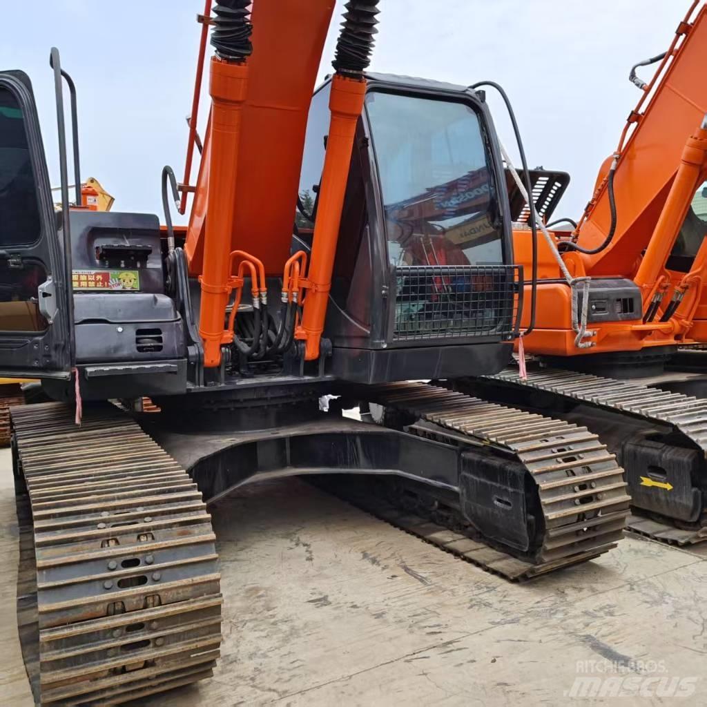 Hitachi ZX 210 Гусеничные экскаваторы
