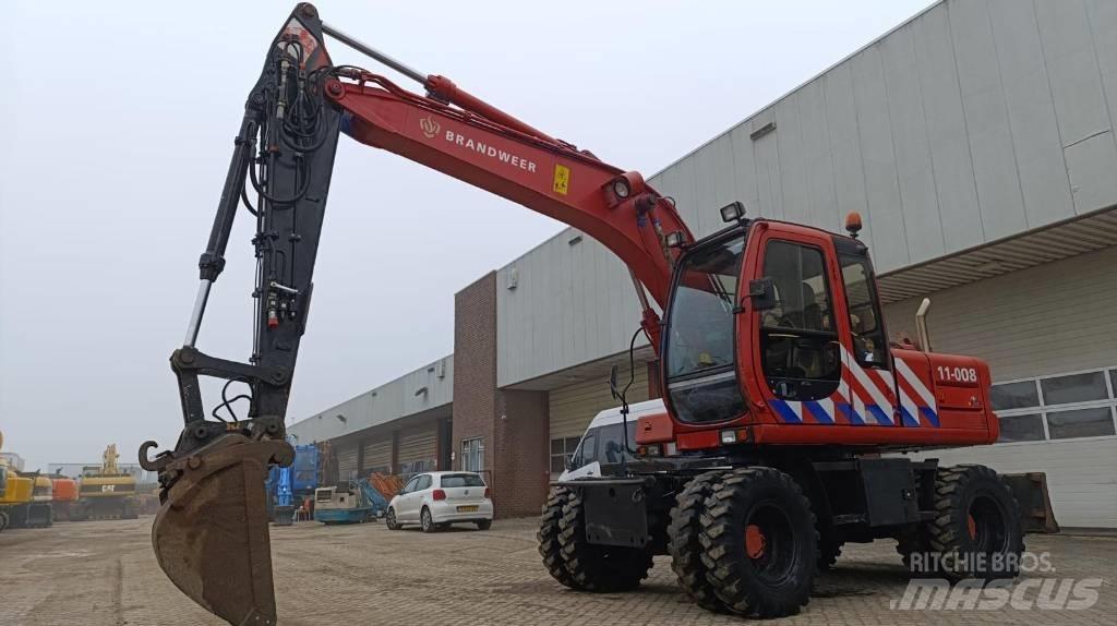 Fiat-Hitachi EX135W Колёсные экскаваторы