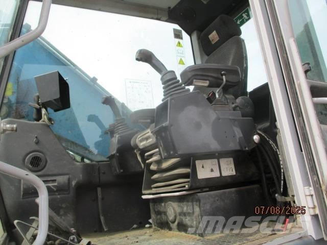 Fuchs MHL 320 Перегружатели металлолома/промышленные погрузчики