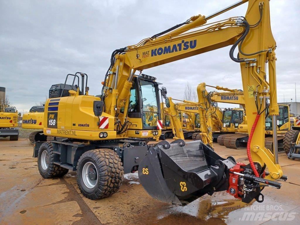 Komatsu PW158-11E0 Колёсные экскаваторы