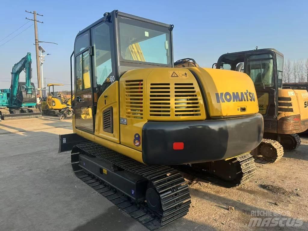 Komatsu PC 60 Гусеничные экскаваторы