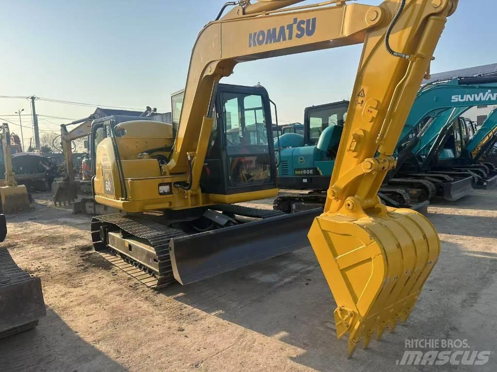 Komatsu PC 60 Гусеничные экскаваторы