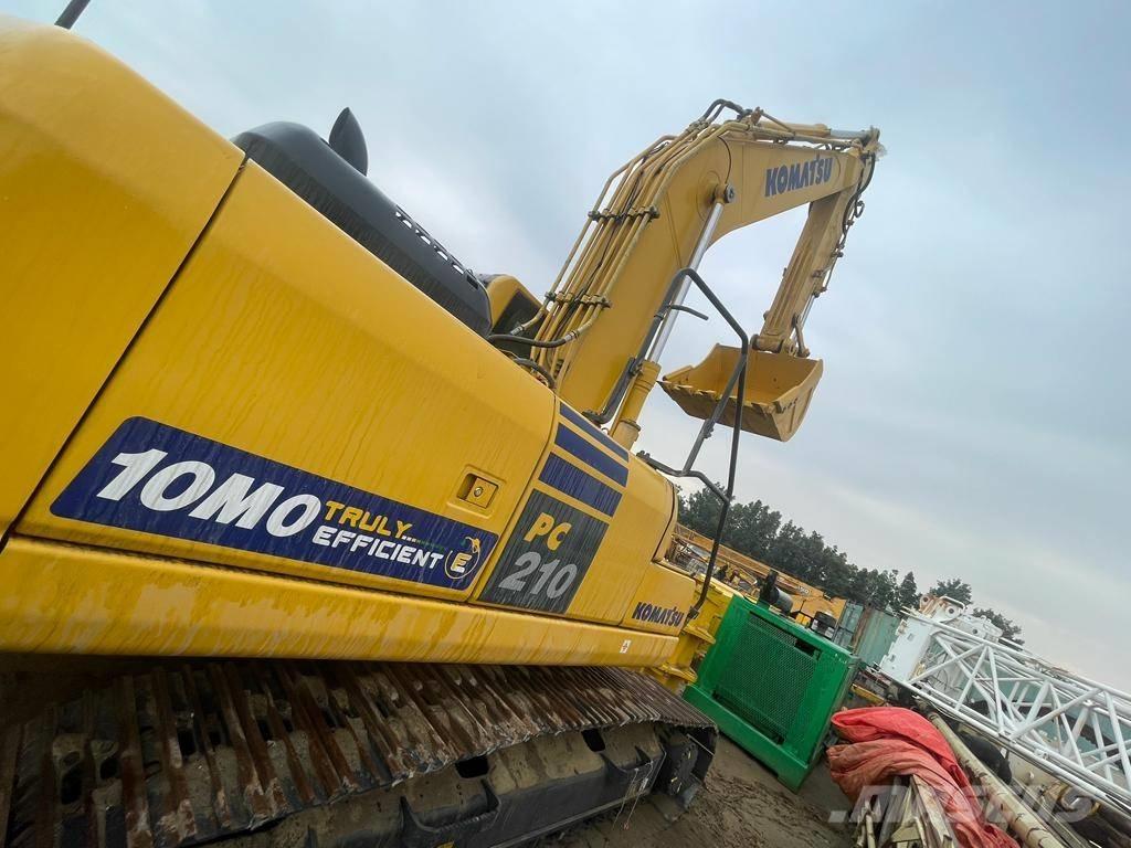 Komatsu PC210-10MO Гусеничные экскаваторы