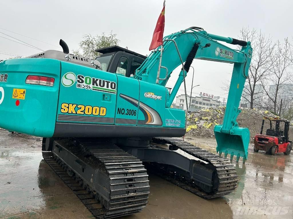 Kobelco SK200D Гусеничные экскаваторы