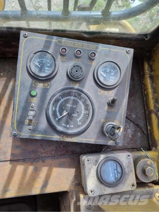 CAT 973 Фронтальные погрузчики