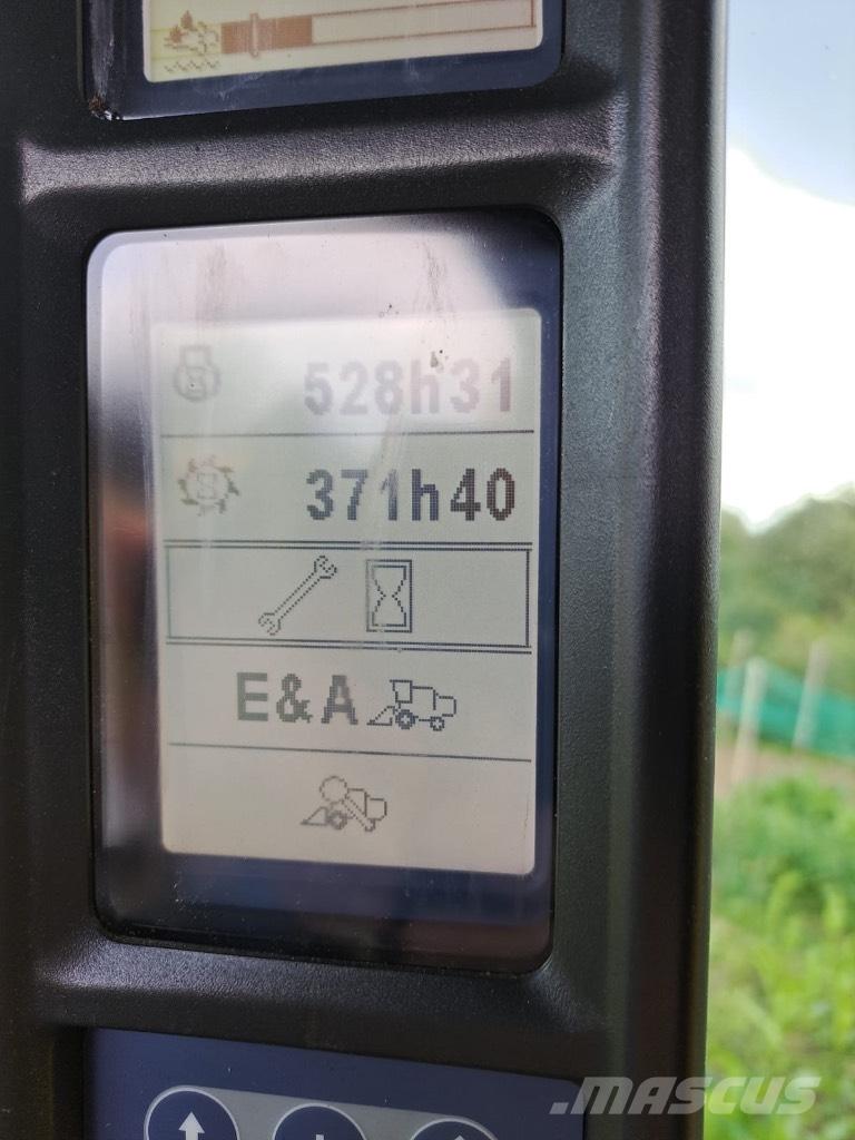 New Holland TC 5.90 Зерноуборочные комбайны