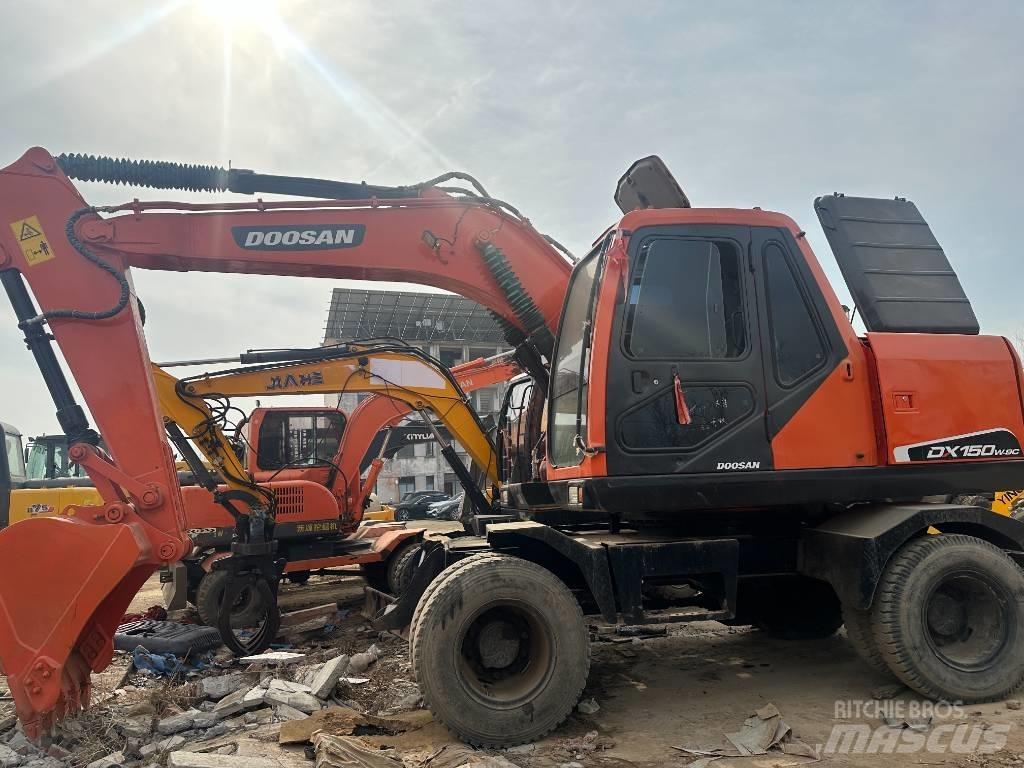 Doosan 150 Колёсные экскаваторы