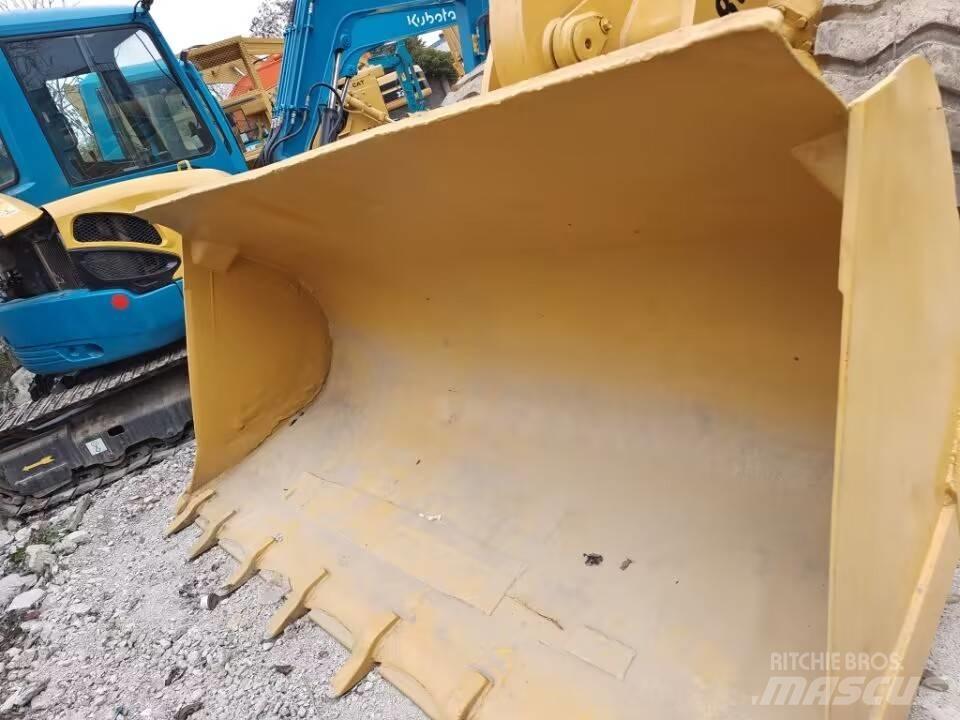 CAT 938G Фронтальные погрузчики