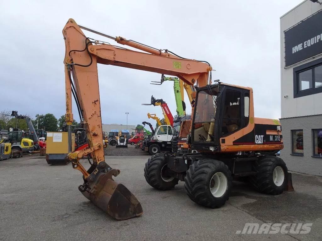 CAT M315 Колёсные экскаваторы