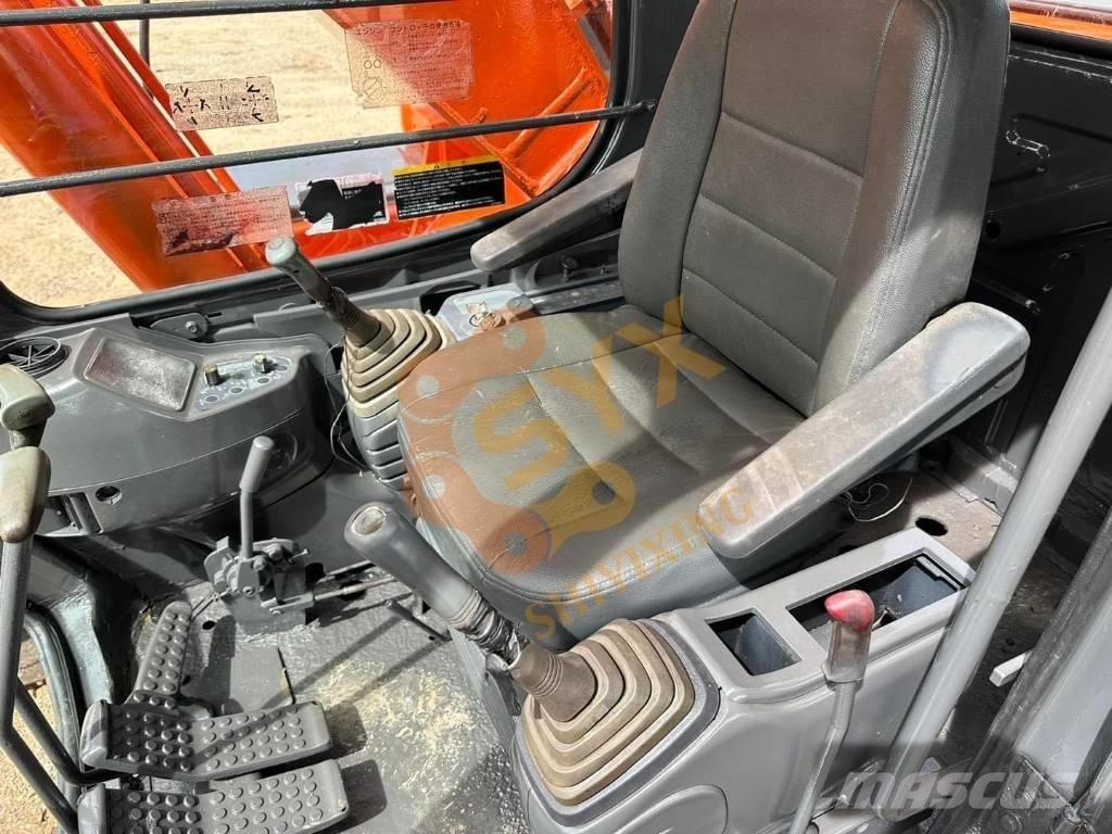 Hitachi EX 200 Гусеничные экскаваторы