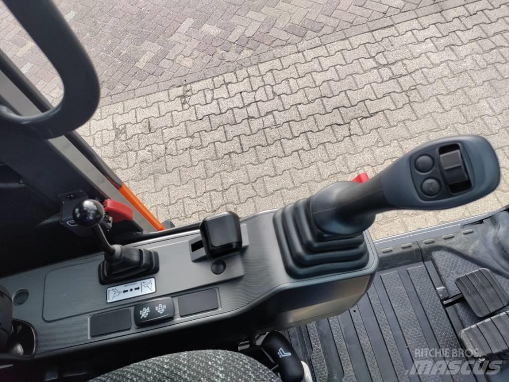Develon DX100W-7 Колёсные экскаваторы