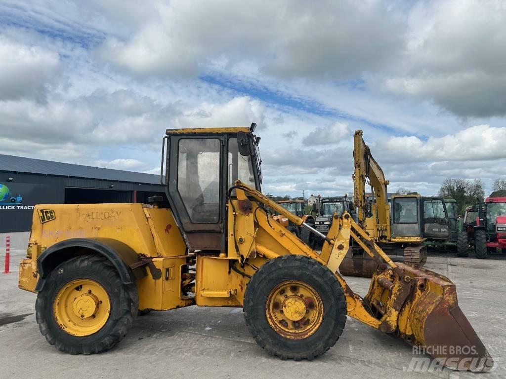 JCB 410 Фронтальные погрузчики