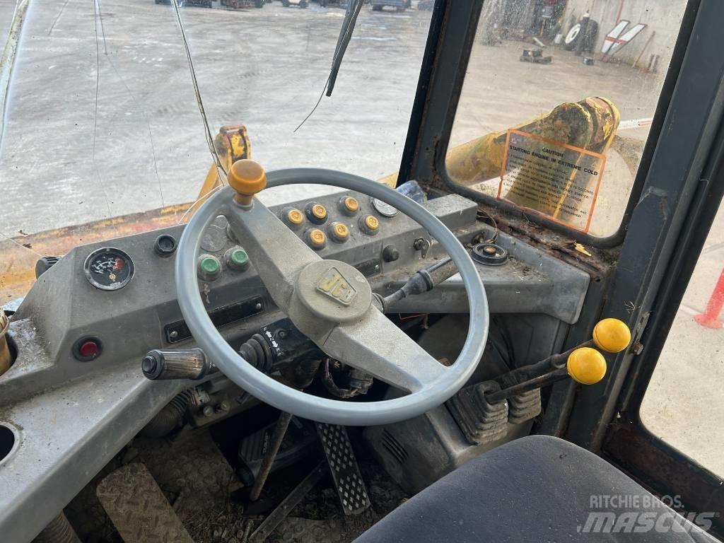 JCB 410 Фронтальные погрузчики