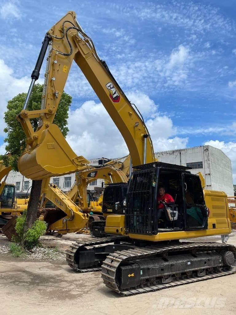 CAT CAT323 Малые экскаваторы 7т-12т