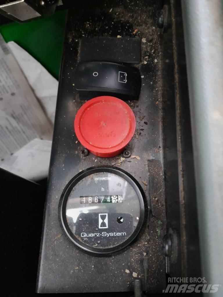 John Deere 1010 E Форвардеры