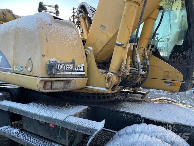 CAT M 322 C MH Колёсные экскаваторы