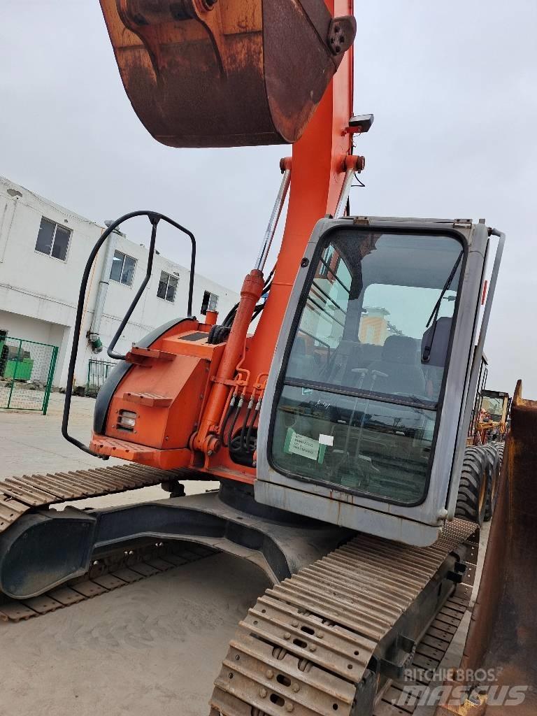 Hitachi ZX 135 US Гусеничные экскаваторы
