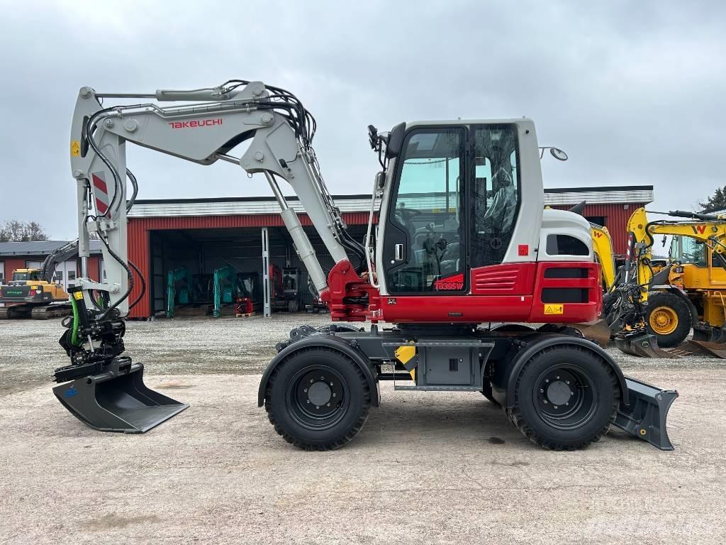 Takeuchi TB395W Колёсные экскаваторы