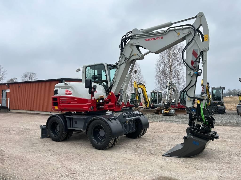 Takeuchi TB395W Колёсные экскаваторы
