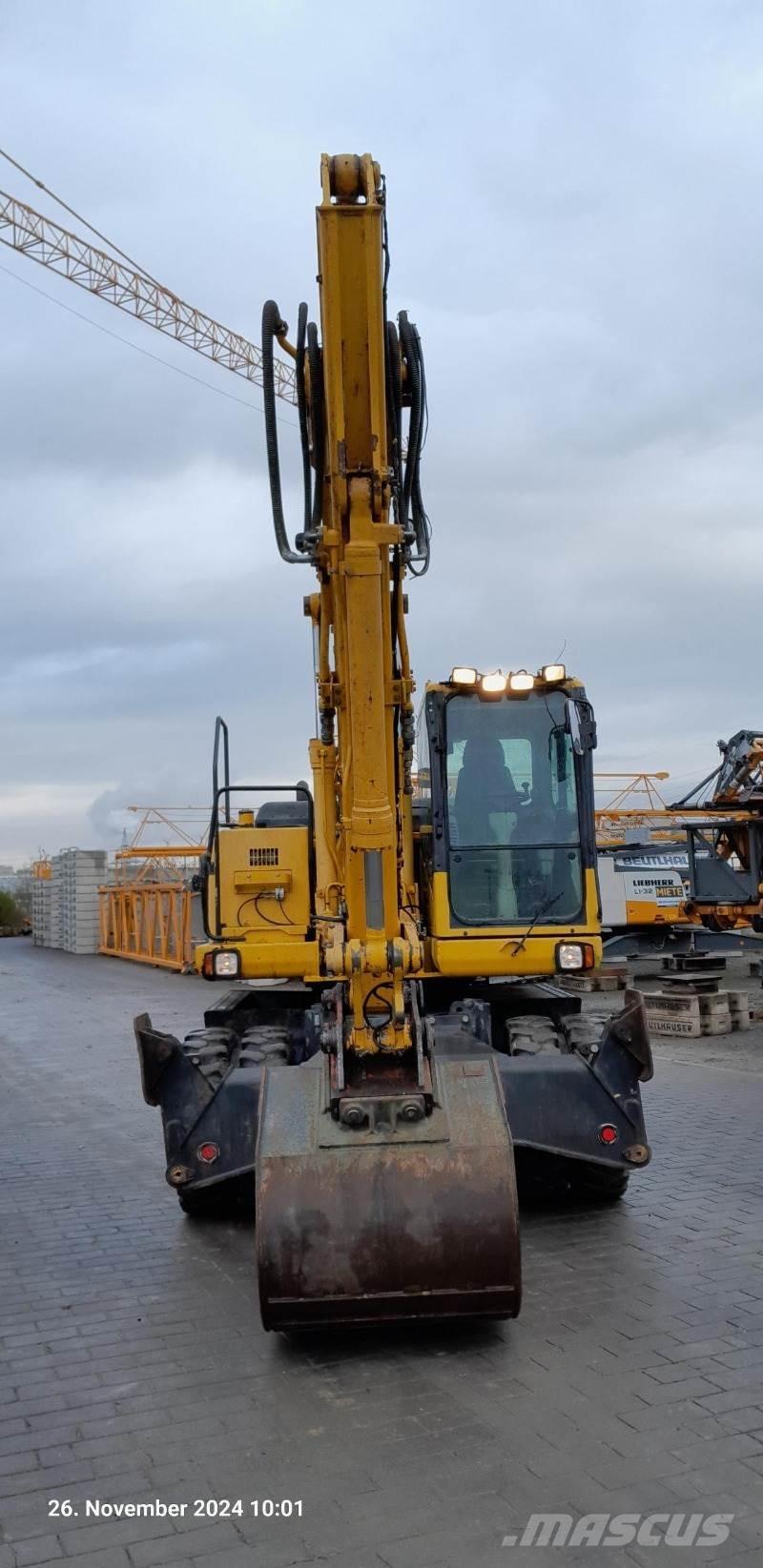 Komatsu PW160-7E0 Колёсные экскаваторы