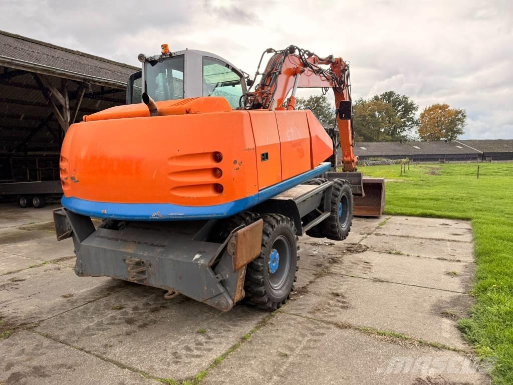 Atlas terex Экскаваторы-харвестеры