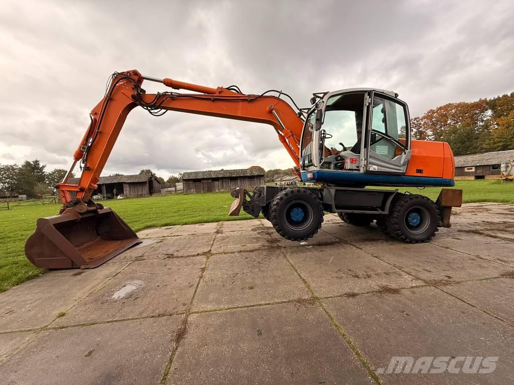 Atlas terex Экскаваторы-харвестеры