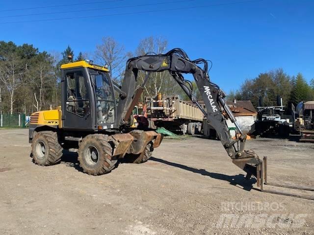 Mecalac 12 M TX Колёсные экскаваторы